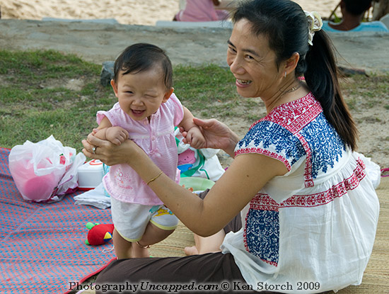 Laughing Baby and Mother - Kata Beach Phuket Thailand