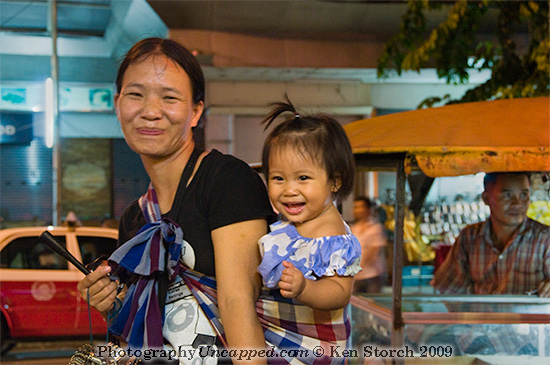 Mother and Child in the Patpong district of Bangkok Thailand